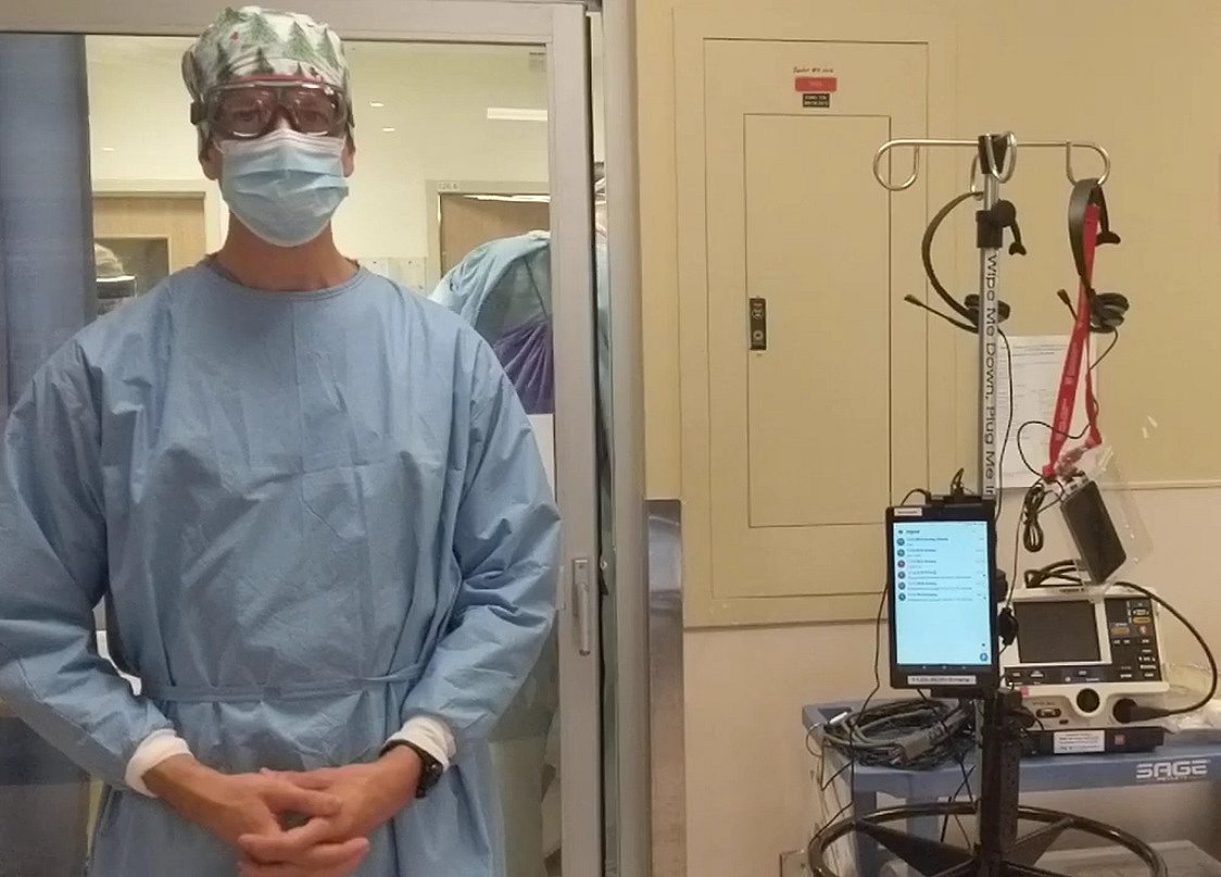 Dr. Brown PPE and Tablet during Covid 19